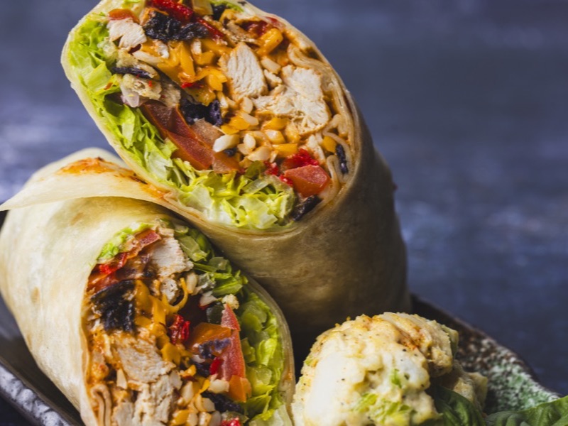 A southwest chicken wrap cut in half
